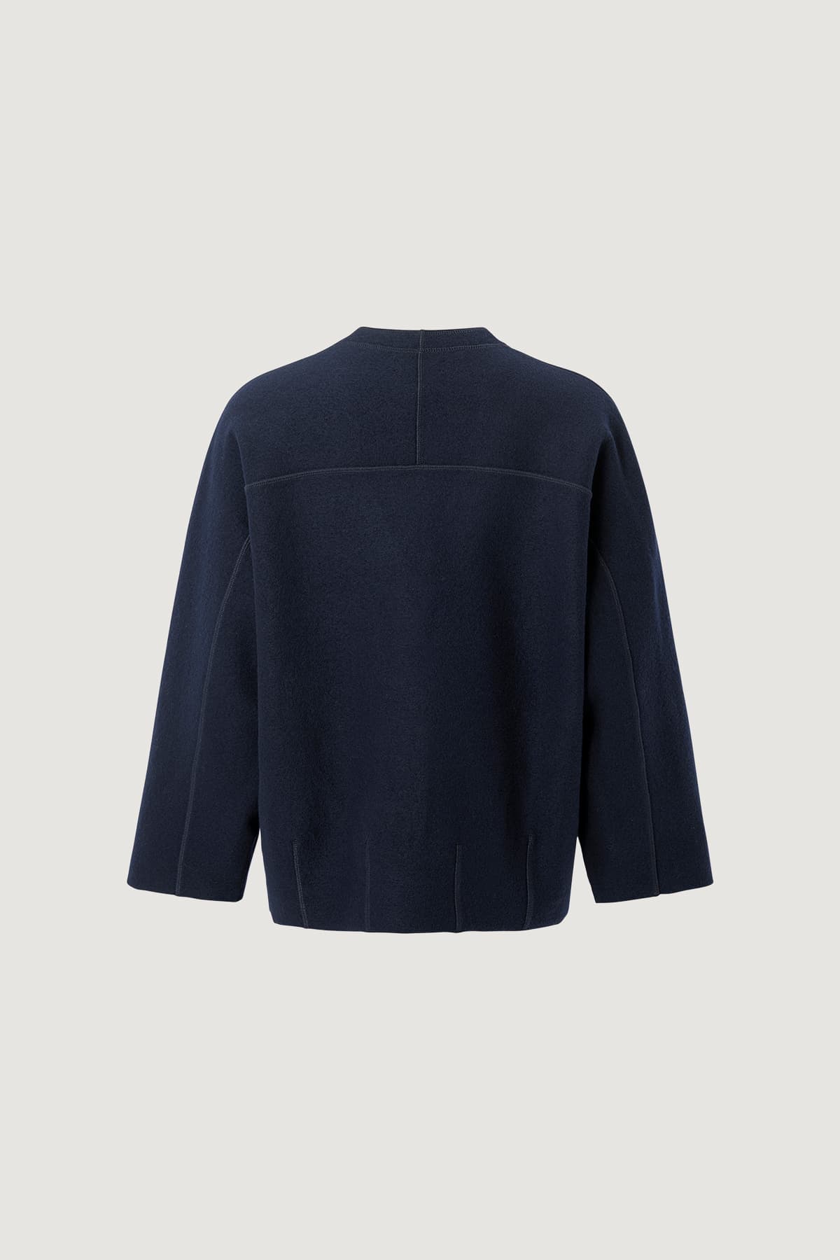 https://a.storyblok.com/f/199965/1200x1800/13b1ebc63f/roma_cardigan_navy_back.jpg